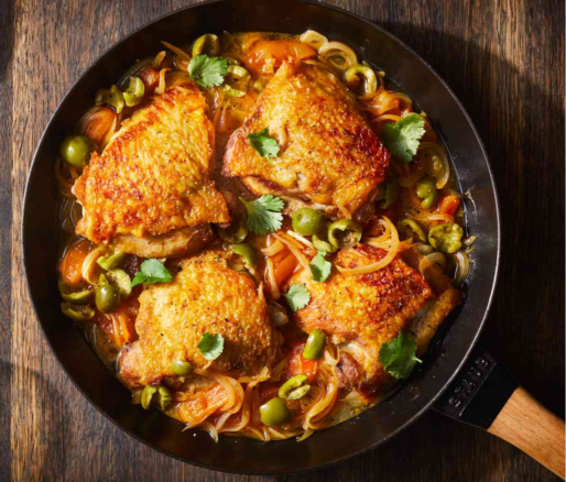 Tender chicken with savory green olives: a flavorful and satisfying dish for poultry enthusiasts.