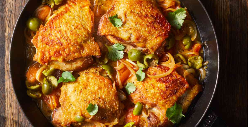 Tender chicken with savory green olives: a flavorful and satisfying dish for poultry enthusiasts.