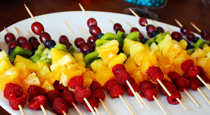 Colorful fruit skewers: a healthy and visually appealing assortment of fresh fruits on skewers