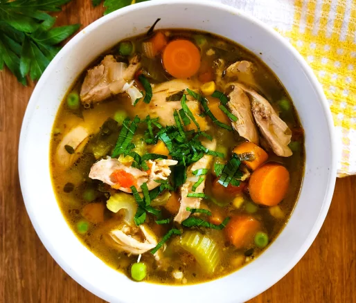 Chicken vegetable soup packed with nutritious ingredients and comforting flavors.