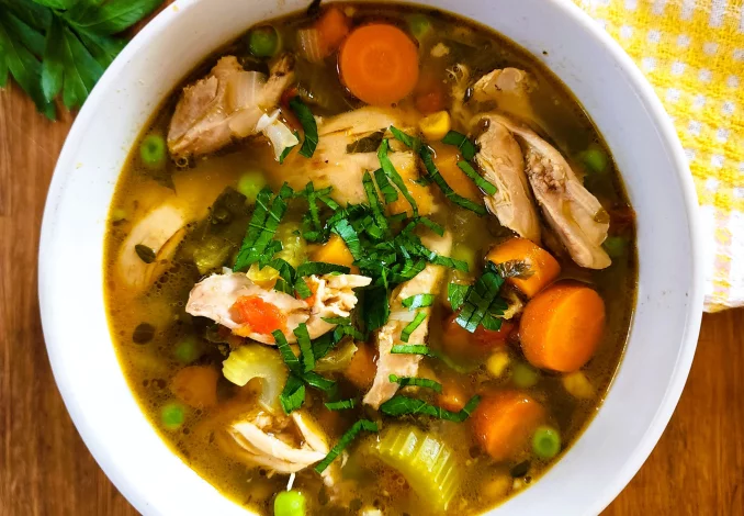 Chicken vegetable soup packed with nutritious ingredients and comforting flavors.