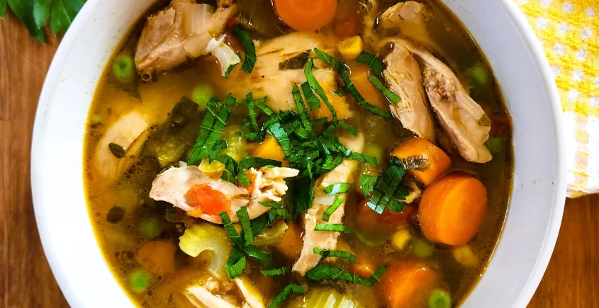 Chicken vegetable soup packed with nutritious ingredients and comforting flavors.